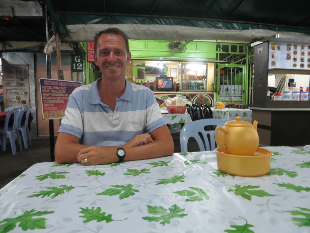 We don't usually eat at hawker stalls, but since we weren't going to get wine with our first dinner anywhere, we ate here. For the two of us the chicken and gado gado came to $12. And it was good!