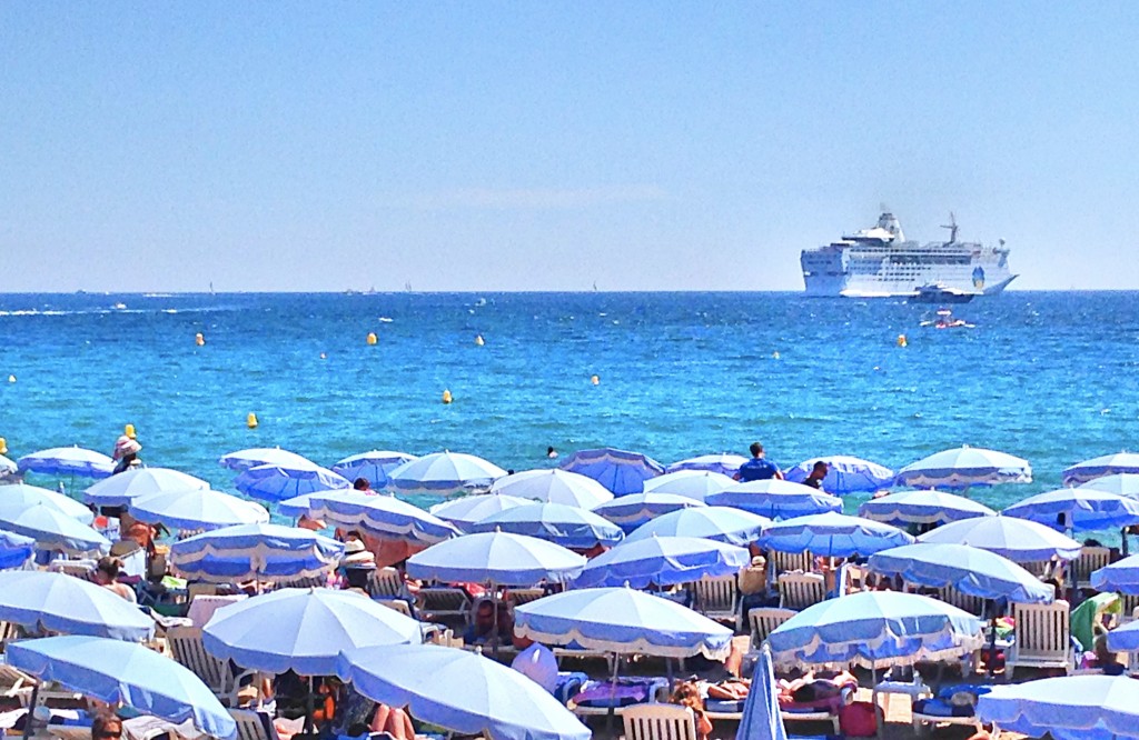 Clear skies, blue water, and lots and lots of people on the beach. This was our view from lunch one day.