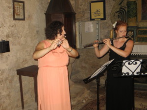 Erica and her flute (along with the soon-to-be bride) in an 11th or 12th century church in Mons