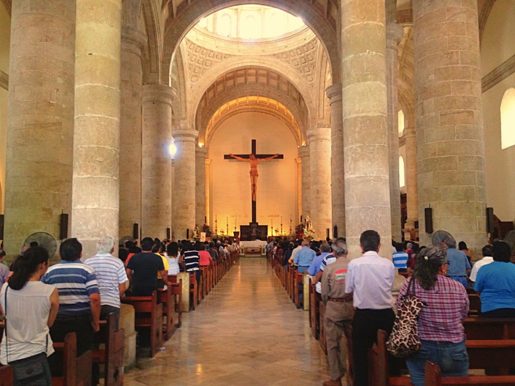 OK, I know this was a religious ceremony. There's a big old cathedral on the Plaza Grande and I went in to look around on Sunday morning. What's interesting to me is that big churches all over Europe are beautiful but largely empty, even on Sundays. In Catholic Mexico, though, there were hundreds of people here for services. Hundreds.