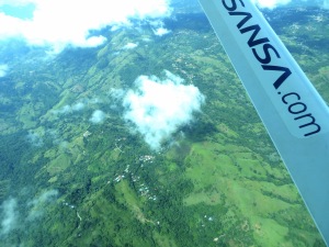 Flying above the lush green landscape of Costa Rica