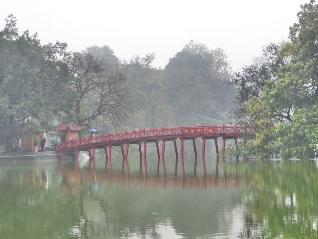 The Rising Sun Bridge, linking the mainland across part of Hoan Kiem Lake to a little temple on an island. For five days the city was misty, cloudy, grey, and beautiful.