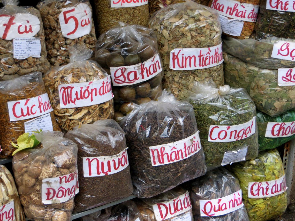 In Hanoi's Old Quarter, the shops on one street will all be selling shoes, another street is all tin boxes, the next one is locks and door handles. This street was herbs and spices and smelled amazing!
