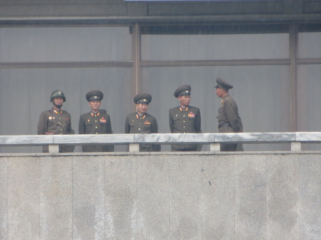 A close up of the North Korean brass watching us. You wonder what they think of the Defense Minister having recently been executed for falling asleep.