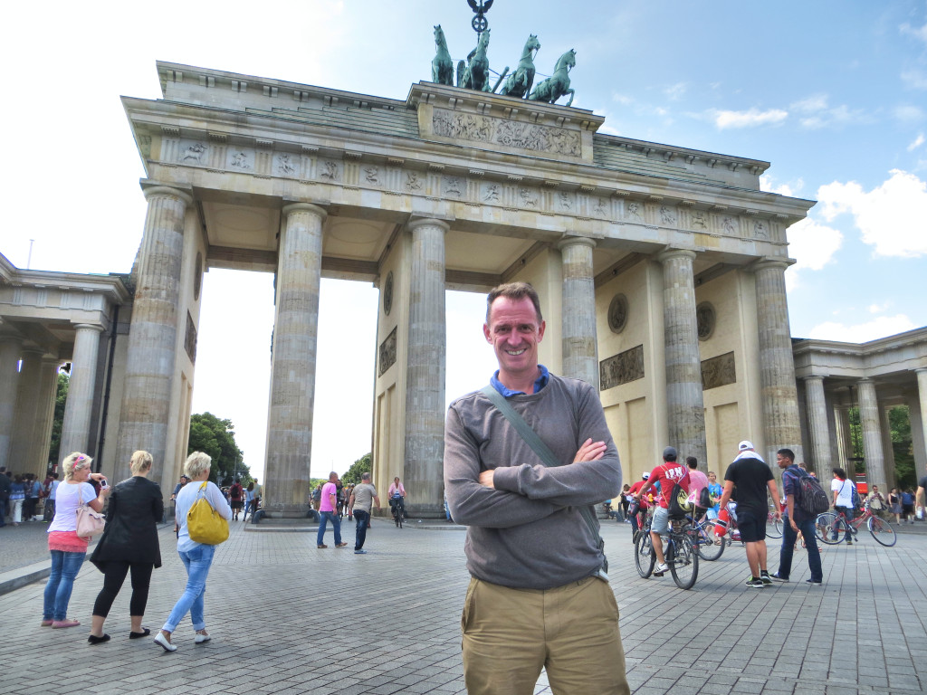 Mark in front of the restored Brandenburg Gate, this time standing in the former East Berlin