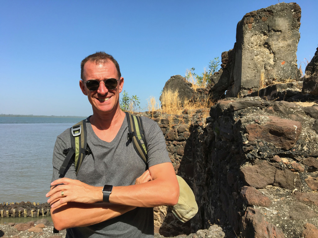Mark standing beside the ruins of the James Island castle