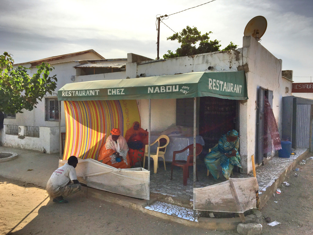 En route across Senegal we stopped here for either a late breakfast or an early lunch. This place defines hole in the wall, but the sandwich she made - hungry beggars can't be choosers when it comes to bread and carbs and all that - was really, really good. The French, you see, left their bread-making skills behind, even in tiny towns like this, so the baguette was world class.