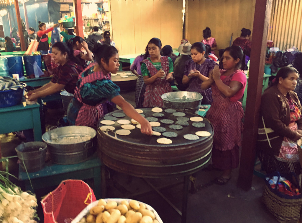 Untold numbers of women all over the market patting out and cooking enormous numbers of tortillas