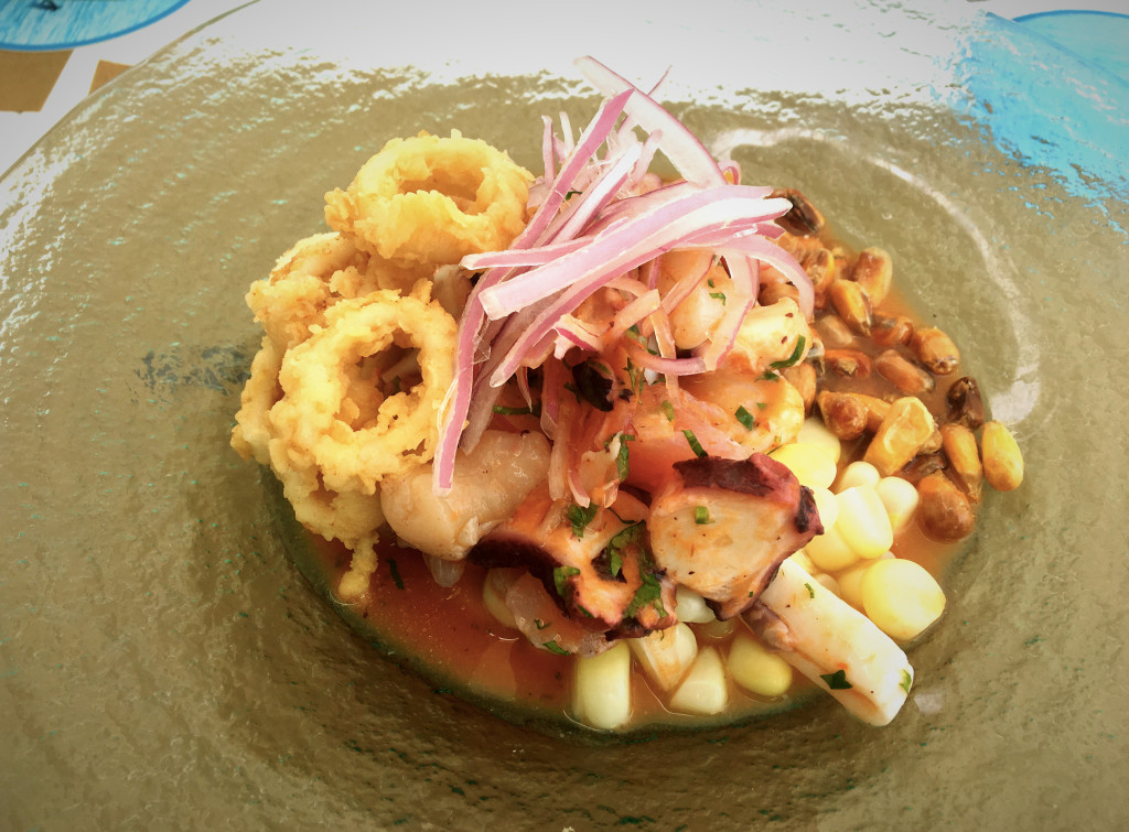 Here we have a classic Peruvian ceviche with just a tiny bit of fried calamari