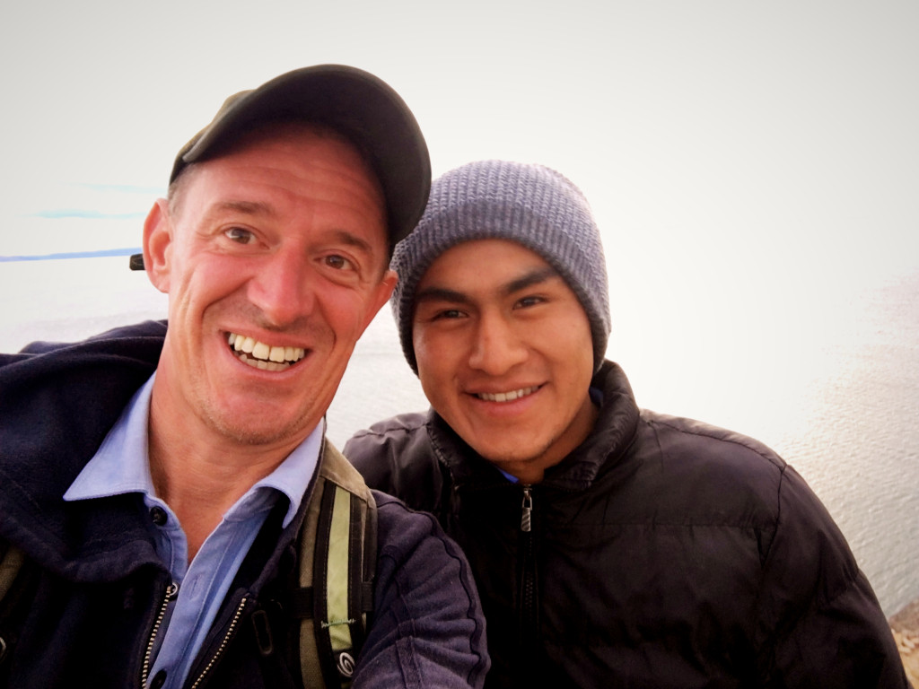 Our first afternoon on the island we hiked up to the highest point on the western edge to see the sunset. Alas, there was no sunset to see due to the clouds, but we did get this nice picture of Mark and our guide Videz.