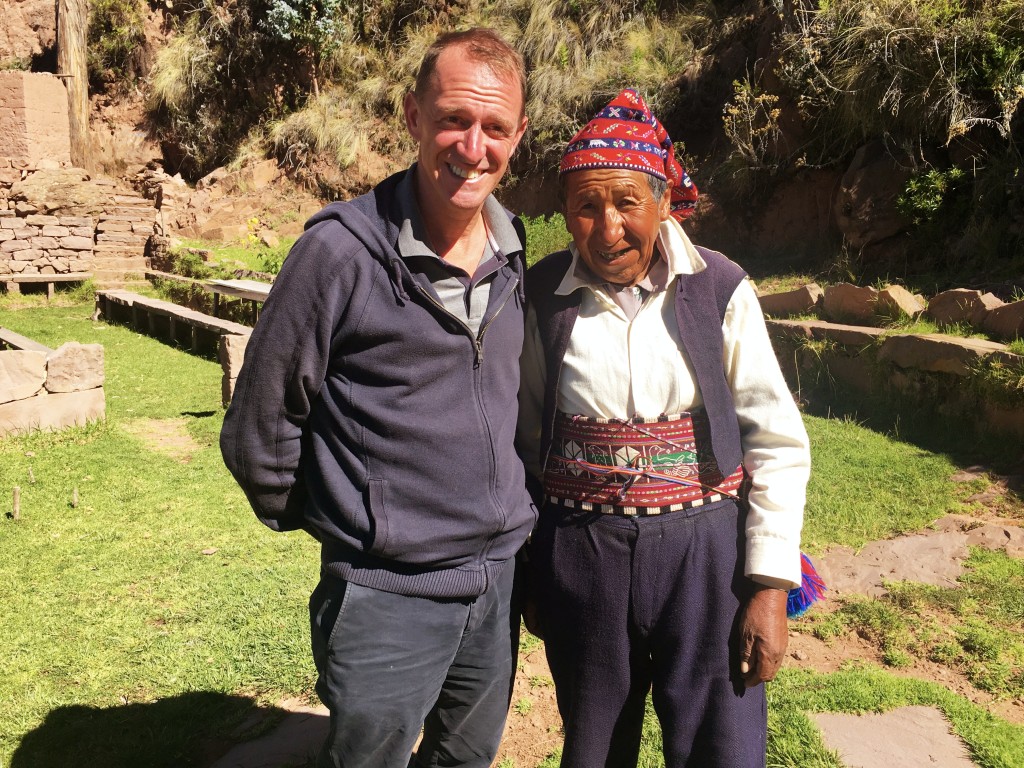 Mark with one of the old guys on Isla Taquile. The men here, our guide pointed out, knit their own hats as well as stuff for their wives.