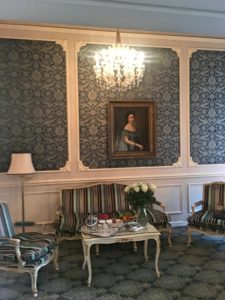 Our sitting room, complete with chandelier and fresh flowers