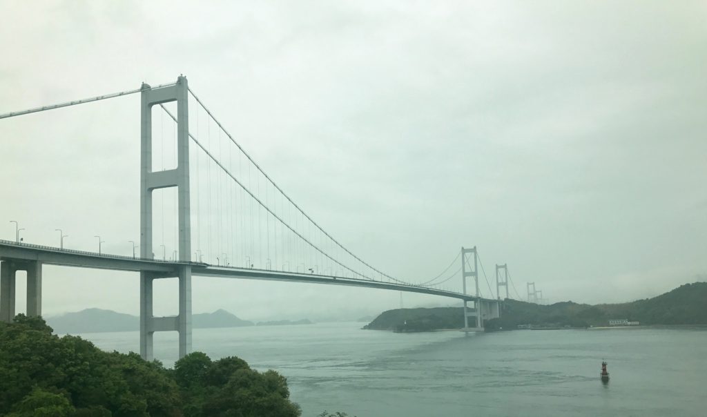 The Kurushima Kaikyo Bridge, the world's longest suspension bridge. And we bicycled over it in the rain!