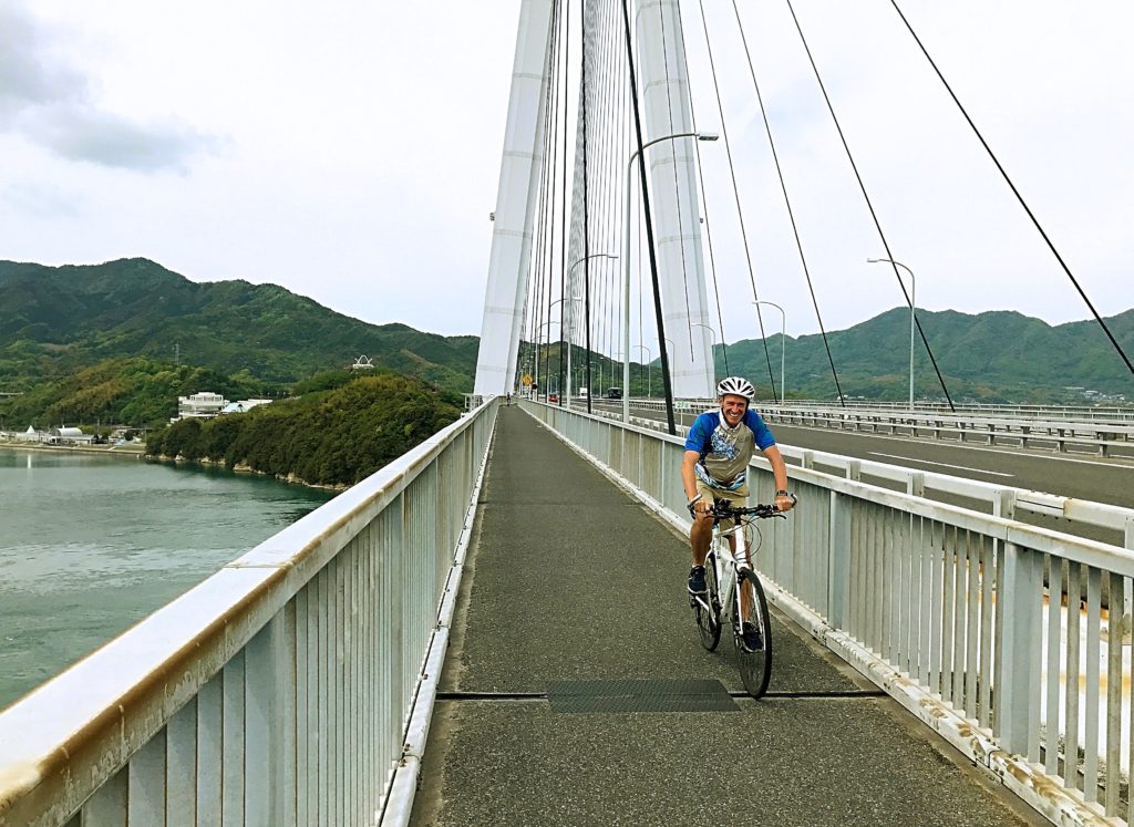 Mark on one of the cable-stayed bridges, this time in the sun (or, well, not exactly sun, but at least it wasn't raining anymore)