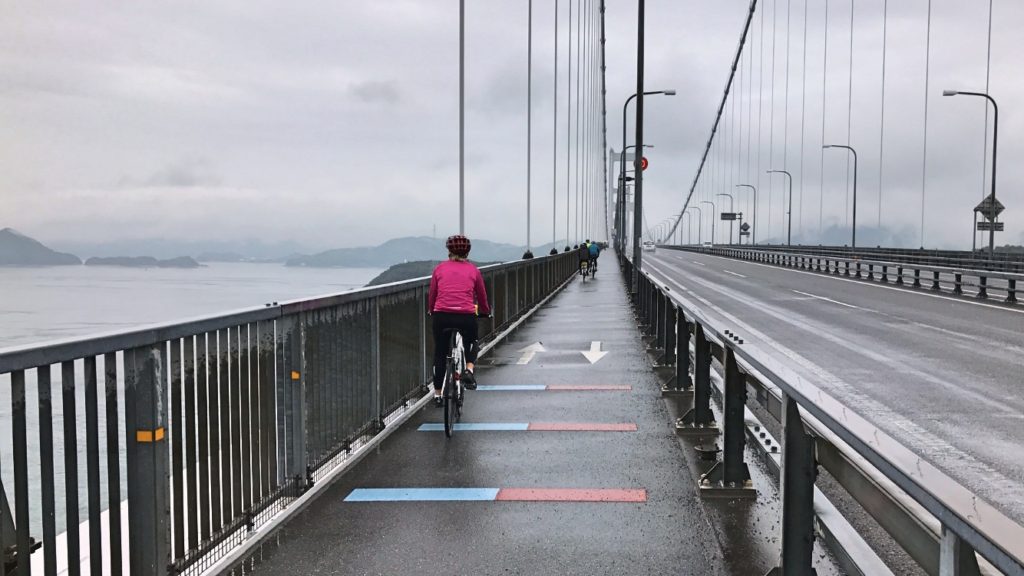 Worried the gray and gloom and rain is going to get you down? Just ride behind Luba and her pink raincoat and that will cheer up anyone.